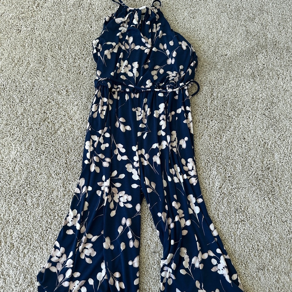 Blue and White Floral Jumpsuit with Halter Neckline and Wide-Leg Pants